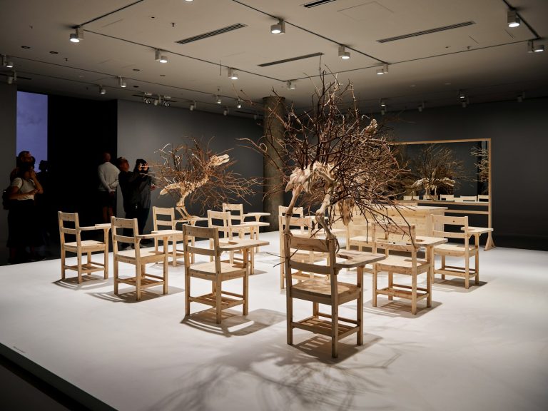 A group of chairs sitting on top of a white floor